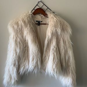 White faux fur coat
